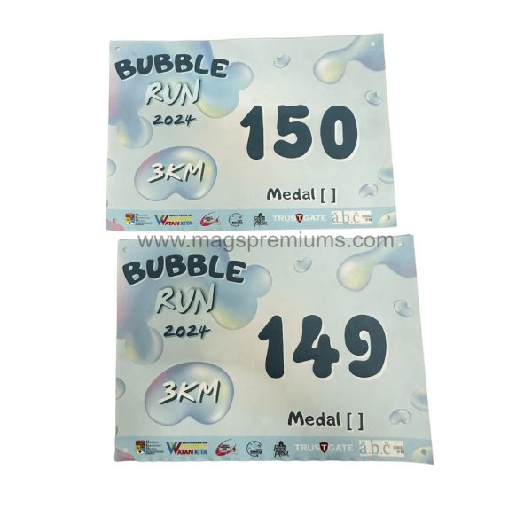 Personalized race bibs for sports events, made from durable Tyvek or fabric material. Ideal for running competitions, cycling races, and corporate sports events. Bulk printing available in Malaysia