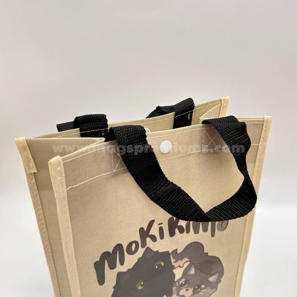 Custom laminated non woven bag with durable handles, ideal for shopping, corporate gifts, and promotional branding