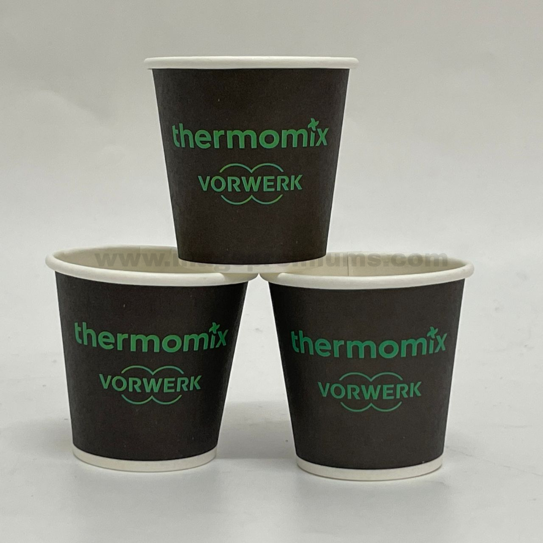 Coffee Cup Printing Malaysia Custom coffee cup printing Malaysia with black disposable paper cups and green logo branding for promotional events and corporate beverage packaging