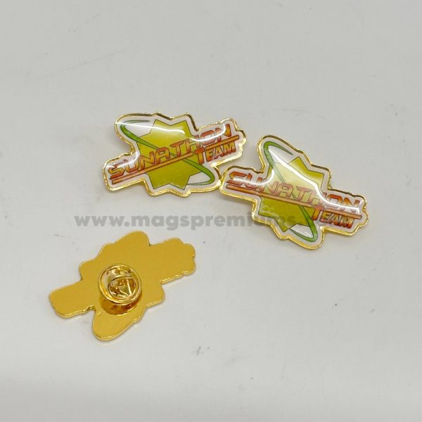 Showcase your brand or event with a custom epoxy lapel pin featuring smooth resin coating and vibrant colours order now to personalise your pins