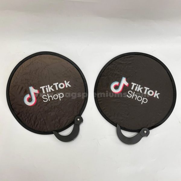 Promotional nylon hand fan that folds neatly into a pouch, ideal for hot weather events—contact us to personalize yours