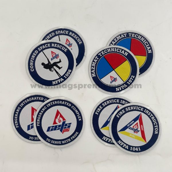 Custom cloth patches with personalized embroidery, perfect for jackets, bags, and corporate branding. Available in various designs and sizes.