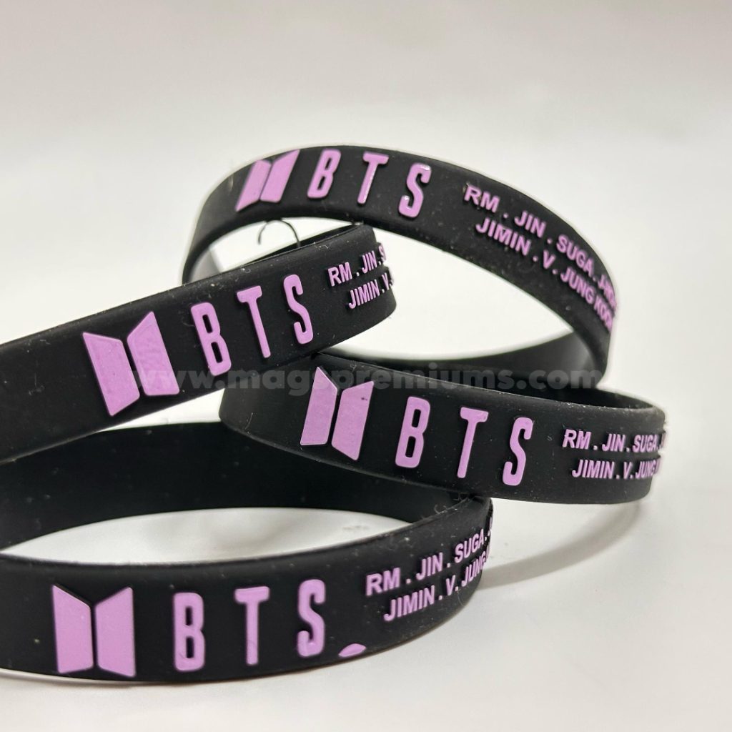 Custom embossed silicone wristbands with raised text or logo, perfect for events, promotions, and fundraising campaigns. Bulk orders available in Malaysia