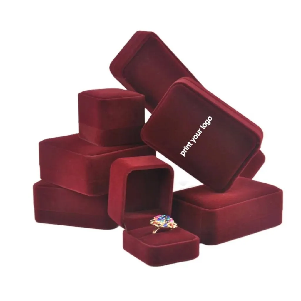 Dark red square jewelry gift boxes stacked together
