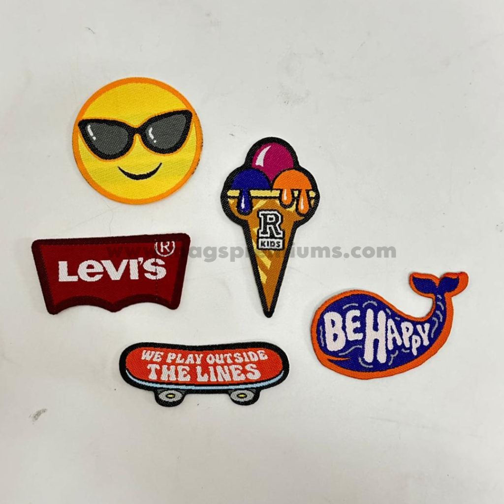 Personalized fabric patches for clothing, featuring custom embroidery or iron-on backing. Ideal for uniforms, events, and brand logos.