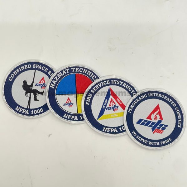 Sublimation logo patches with premium quality printing, suitable for fashion brands, uniforms, and corporate promotions. Bulk orders available in Malaysia