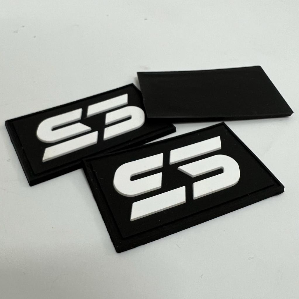 Custom rubber patches with raised logo design, perfect for uniforms, tactical gear, and branding. Bulk orders available in Malaysia