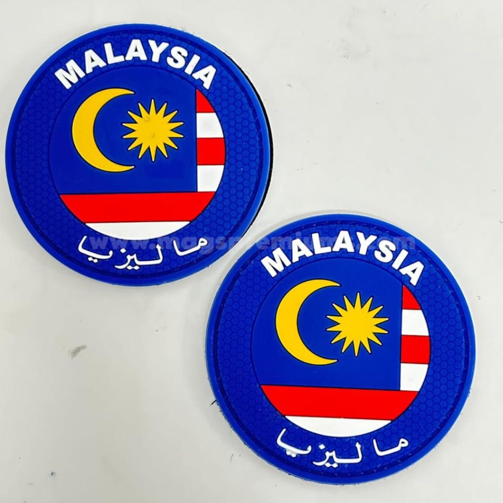 urable PVC rubber patches with custom logo embossing, ideal for outdoor gear, sportswear, and corporate branding. Bulk supply available