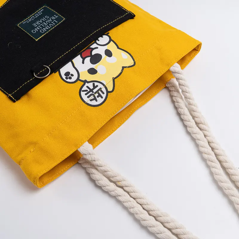 Personalized Canvas Bag Canvas bag with logo and rope handle, close-up of printed design