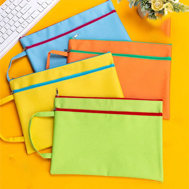 Canvas Zipper Storage Bag Canvas zipper bags in multiple colors, flat lay view of storage pouches