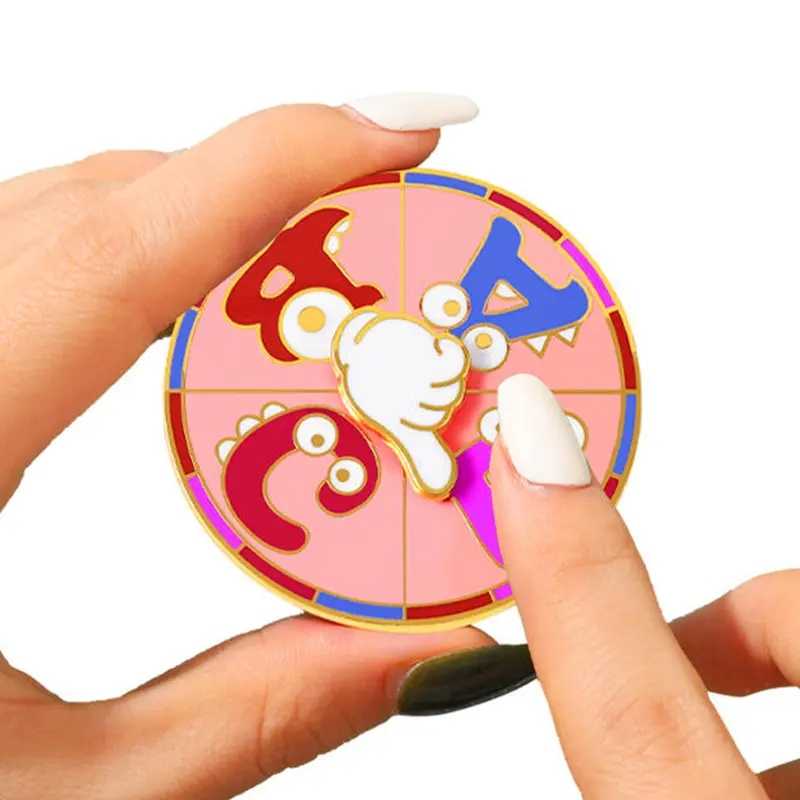 Custom Spinning Enamel Pin round colorful enamel spinner pin being rotated by hand