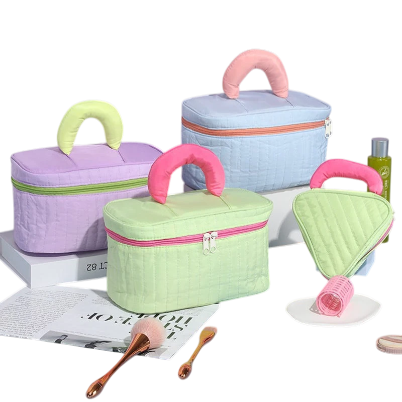 Customize Make Up Bag pastel travel beauty cases with handle displayed on table