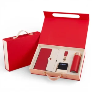 red corporate gift hamper set with tumbler notebook and tech accessories
