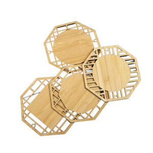 engraved bamboo coaster set with intricate border design for table use