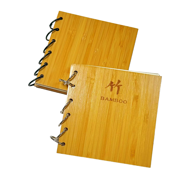 engraved bamboo notebook with logo cover and refillable pages for corporate gifts