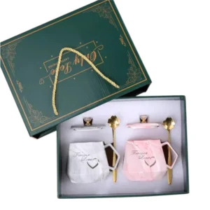 pastel ceramic tea cup set with crown design and gift bag packaging