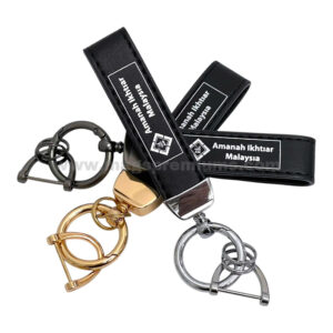 Executive leather keychain available in silver, gold and gunmetal finishes with custom logo printing.