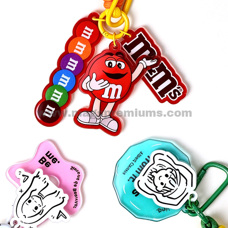 Translucent Acrylic Keychain Colorful acrylic keychains with cartoon character designs and metal key rings.