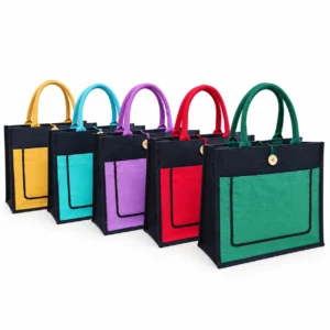 Jute bags with pocket and coloured cotton handles in mustard, teal, purple, red and green