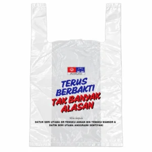 Clear plastic carrier bag with printed Malay slogan, an example of custom plastic bag printing