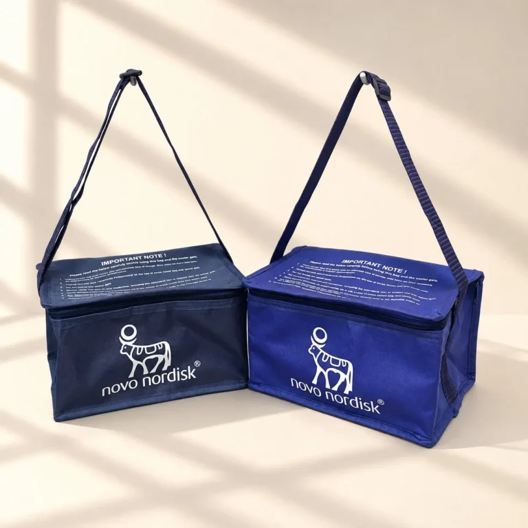 Custom printed navy and blue cooler bags with shoulder straps for Novo Nordisk
