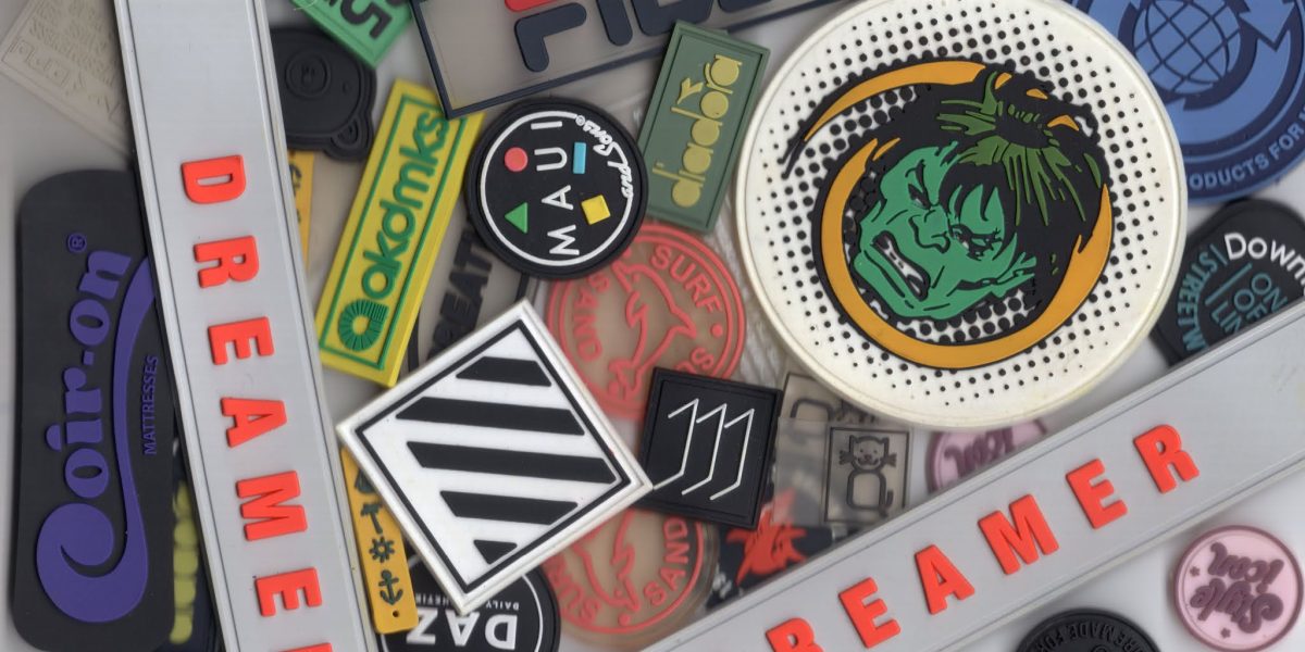 Custom rubber patches with raised logo design, perfect for uniforms, tactical gear, and branding. Bulk orders available in Malaysia